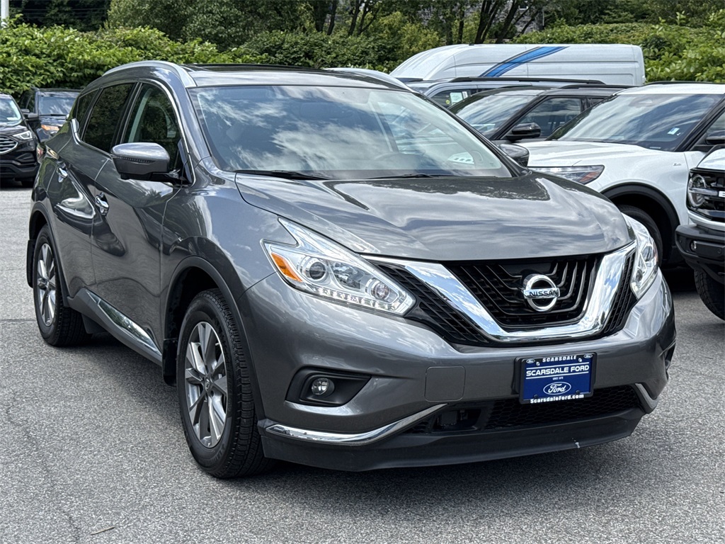 Used 2016 Gun Metallic Nissan SL image 1
