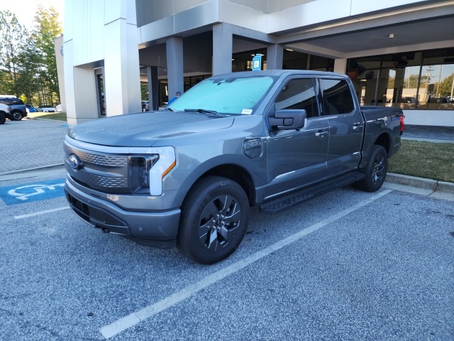 Certified 2023 Ford F-150 Lightning XLT with VIN 1FTVW1EL1PWG27911 for sale in Snellville, GA