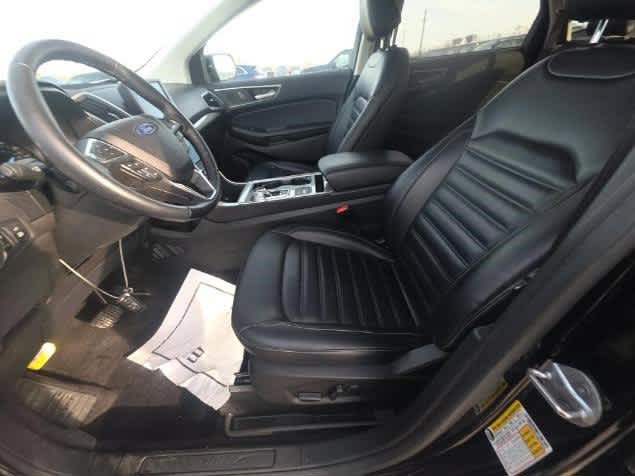 Used 2023 Ford Edge SEL with VIN 2FMPK4J97PBA10672 for sale in Minneapolis, Minnesota