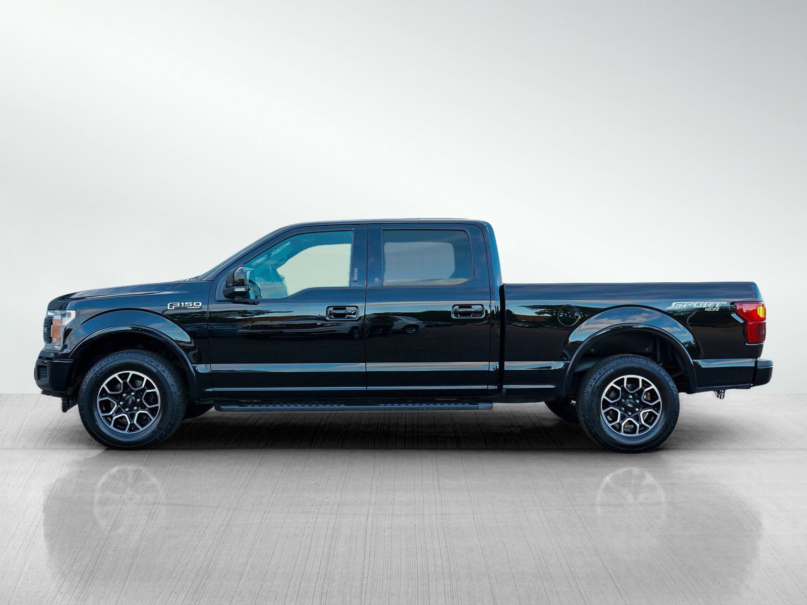 Used 2018 Ford F-150 Lariat with VIN 1FTFW1E5XJFA49594 for sale in Minneapolis, Minnesota