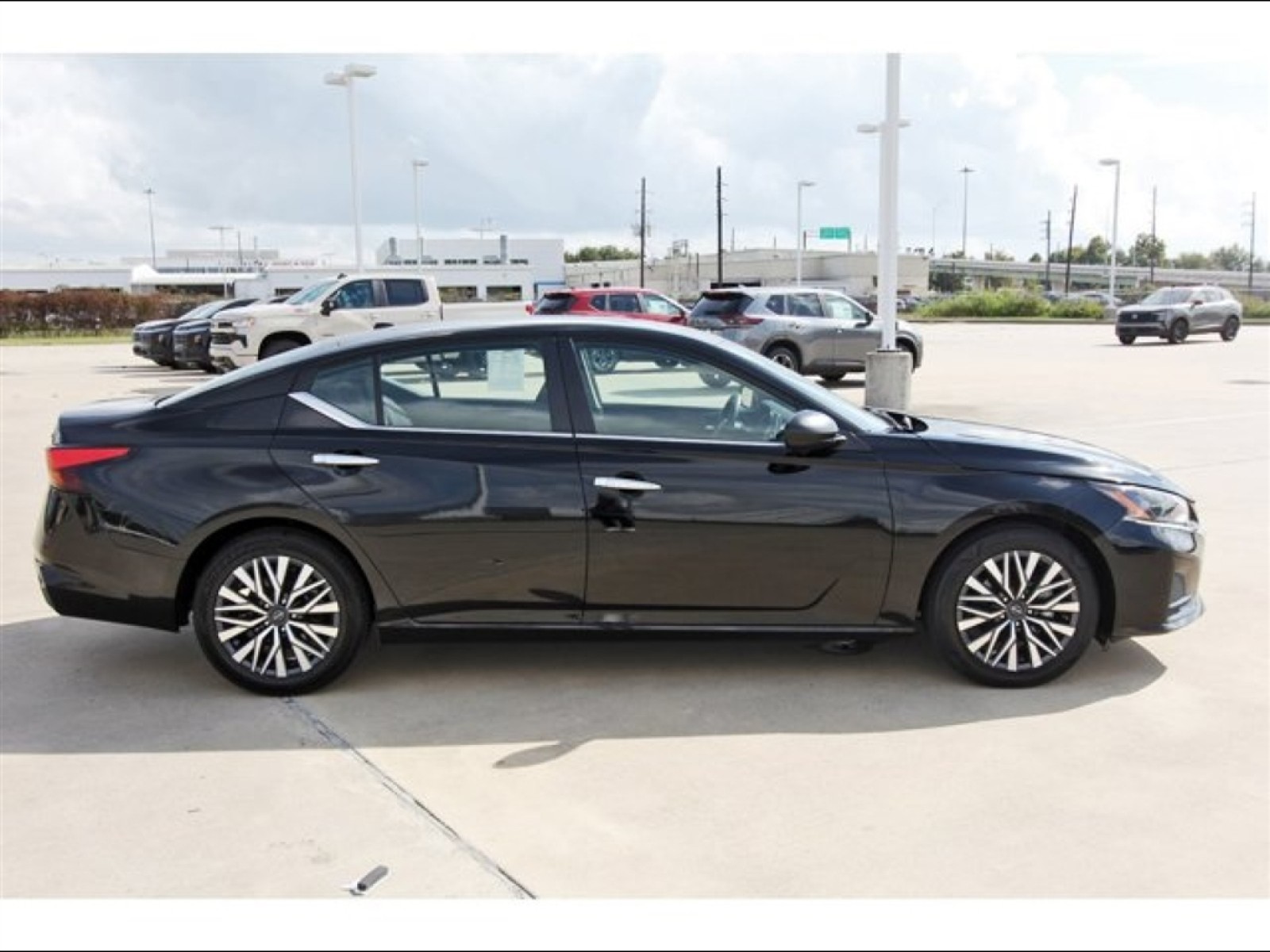 2024 Nissan Altima 2.5 SV Black at Robbins Nissan
