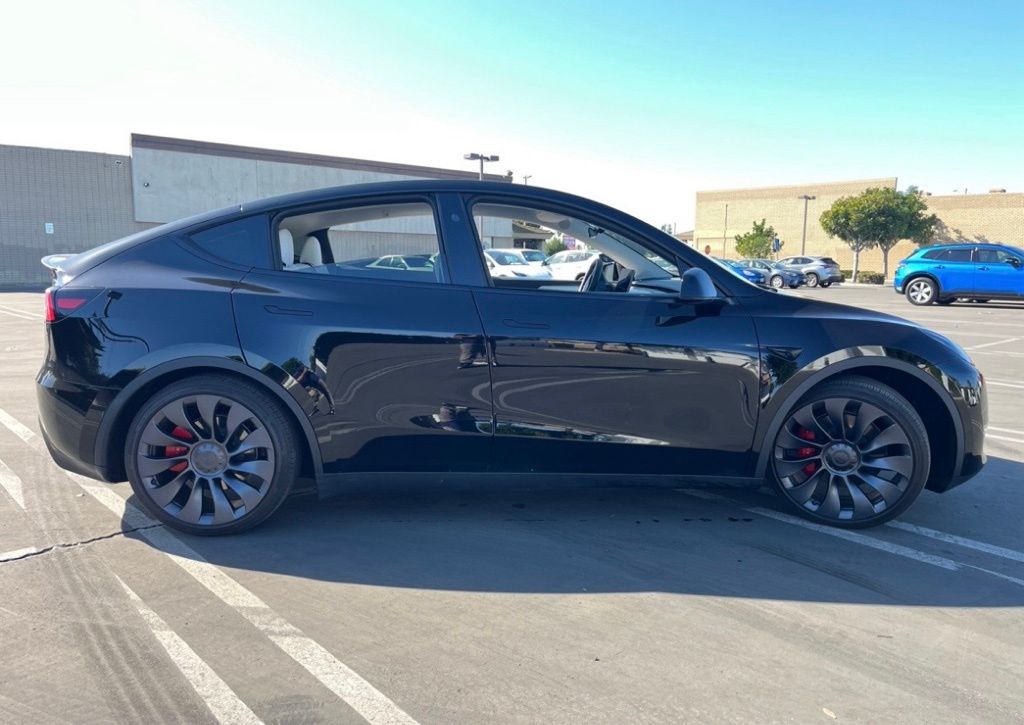 Used 2025 Tesla Model Y Performance with VIN 7SAYGDEF3SF312307 for sale in Kansas City