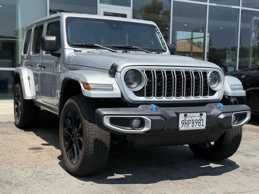Used 2024 Silver Jeep Sahara 4xe image 1