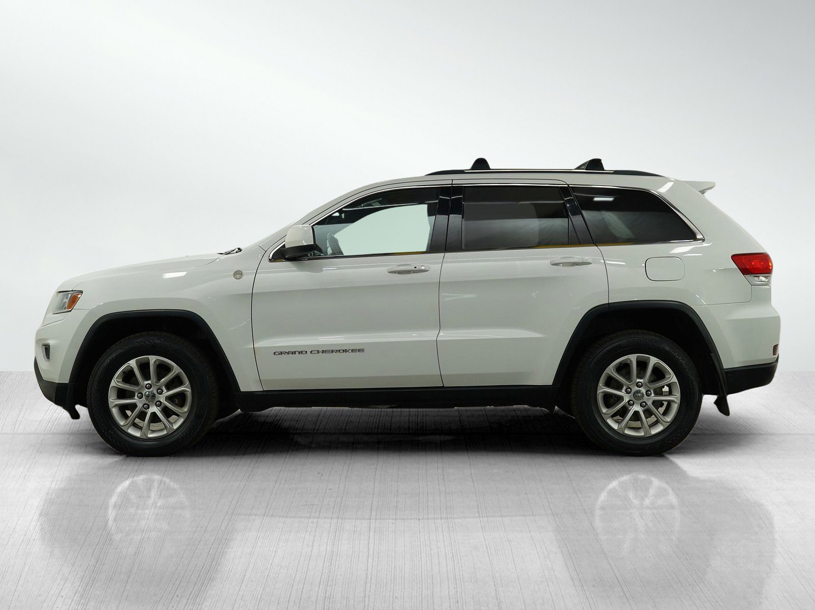 Used 2014 Jeep Grand Cherokee Laredo with VIN 1C4RJFAG8EC451945 for sale in Burnsville, Minnesota