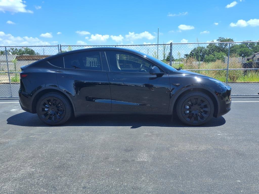 Used 2023 Tesla Model Y Long Range with VIN 7SAYGDEE0PA150390 for sale in Kirkwood, MO