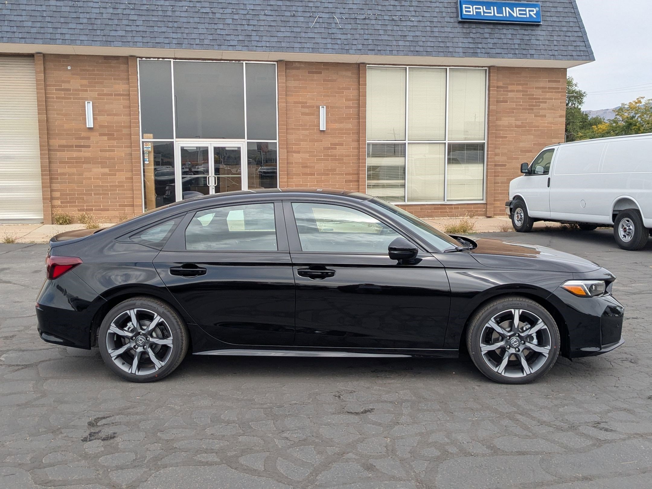 2026 Honda Civic Sport Touring Hybrid photo 2