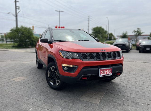 Used 2018 Spitfire Orange Jeep Trailhawk image 1