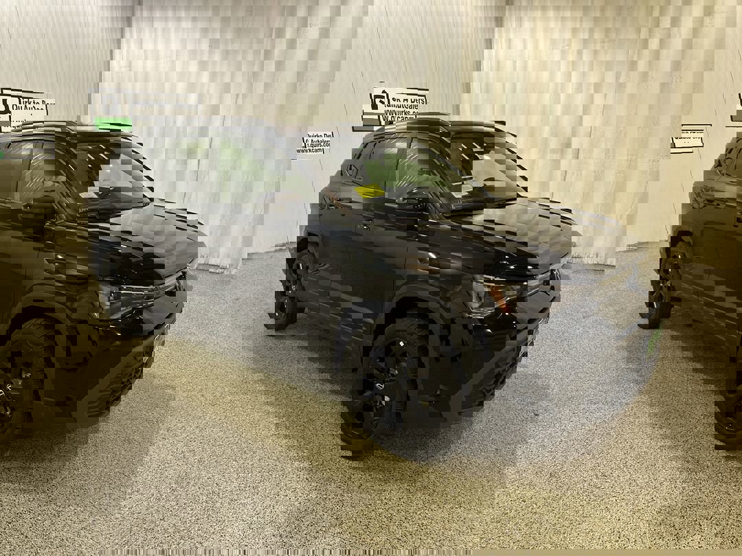 2025 Volkswagen Taos SE Black's photo