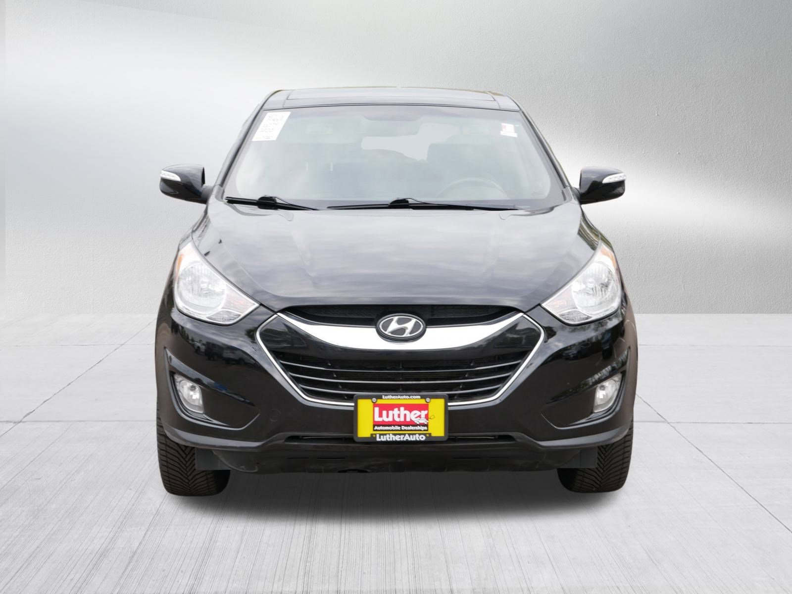 Used 2012 Hyundai Tucson Limited with VIN KM8JUCAC8CU373864 for sale in Hopkins, Minnesota