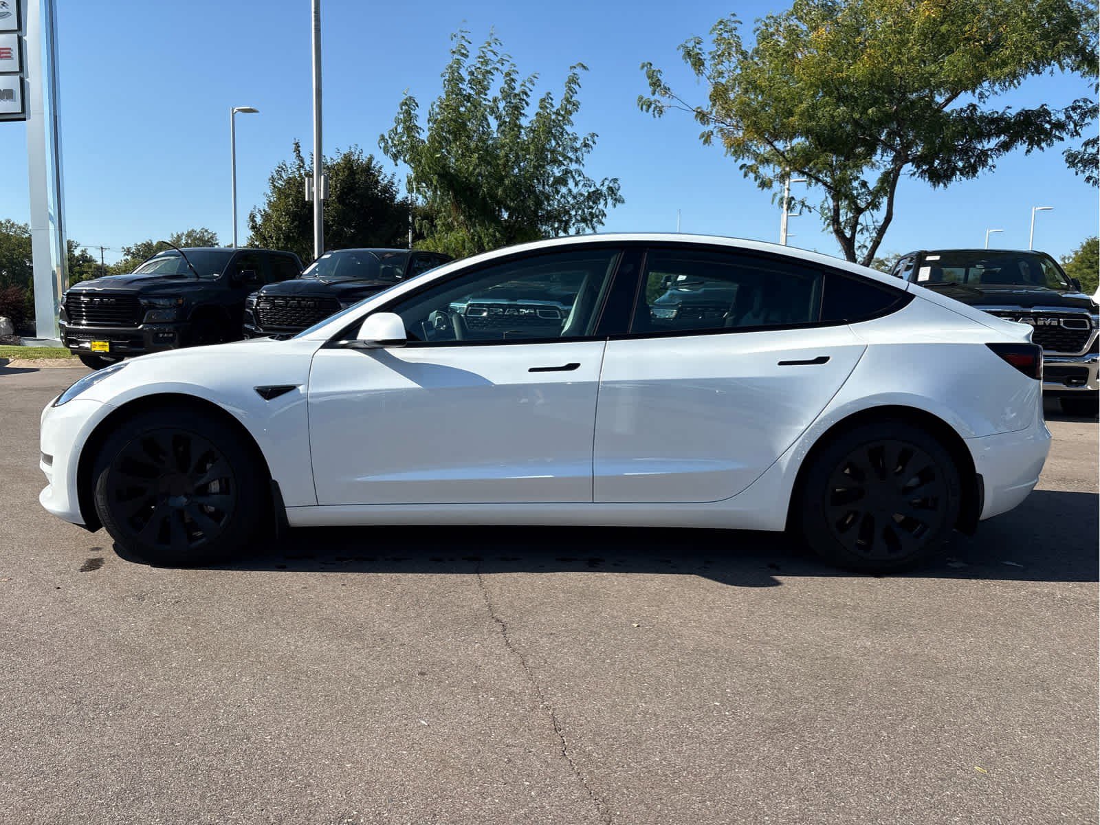 Used 2022 Tesla Model 3 Long Range with VIN 5YJ3E1EBXNF294692 for sale in Brooklyn Park, MN