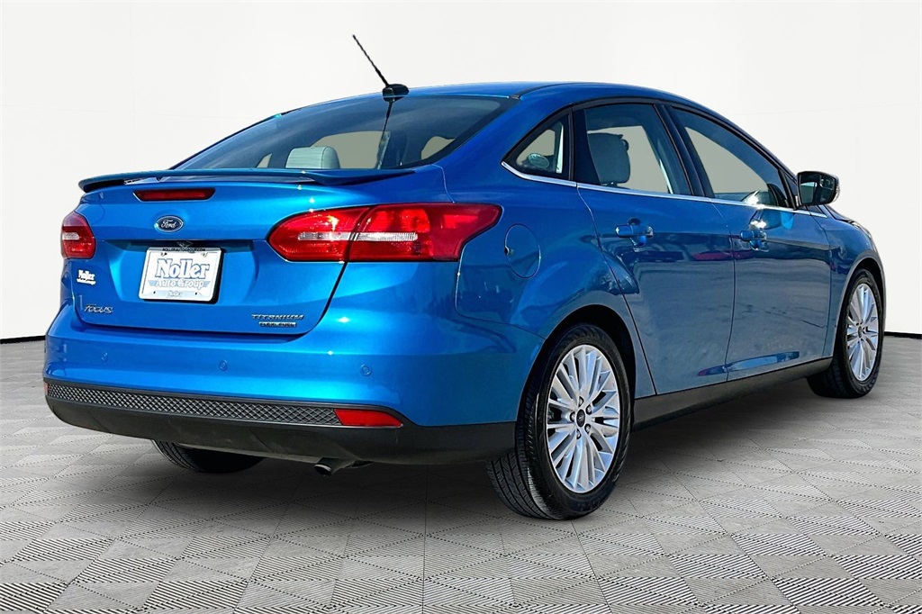 Used 2015 Ford Focus Titanium with VIN 1FADP3J29FL374795 for sale in Kansas City