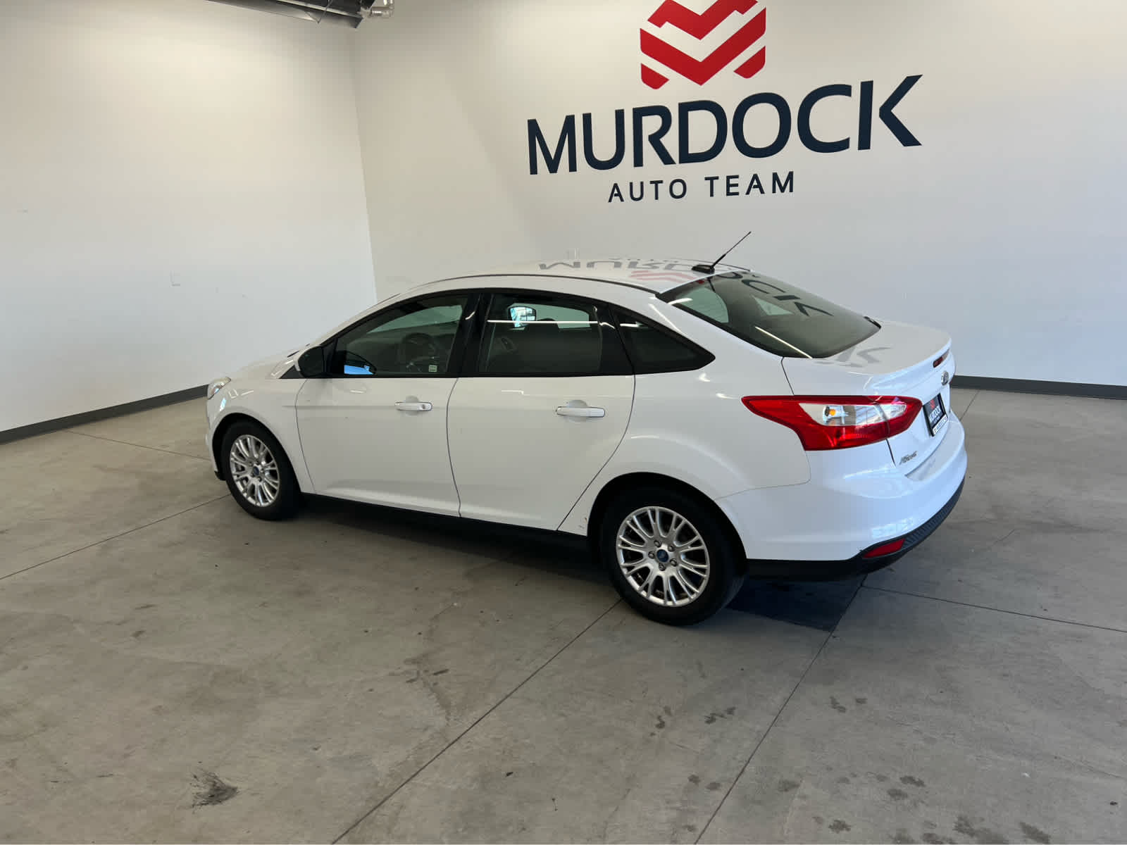 Used 2012 Ford Focus SE with VIN 1FAHP3F2XCL403579 for sale in Logan, UT
