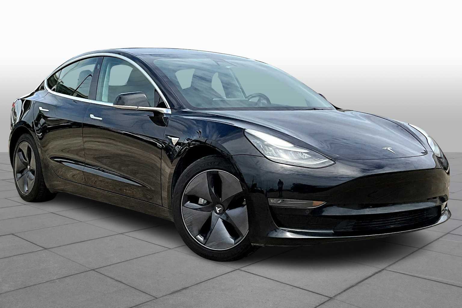 Used 2019 Tesla Model 3 Mid Range with VIN 5YJ3E1EAXKF306570 for sale in Tomball, TX