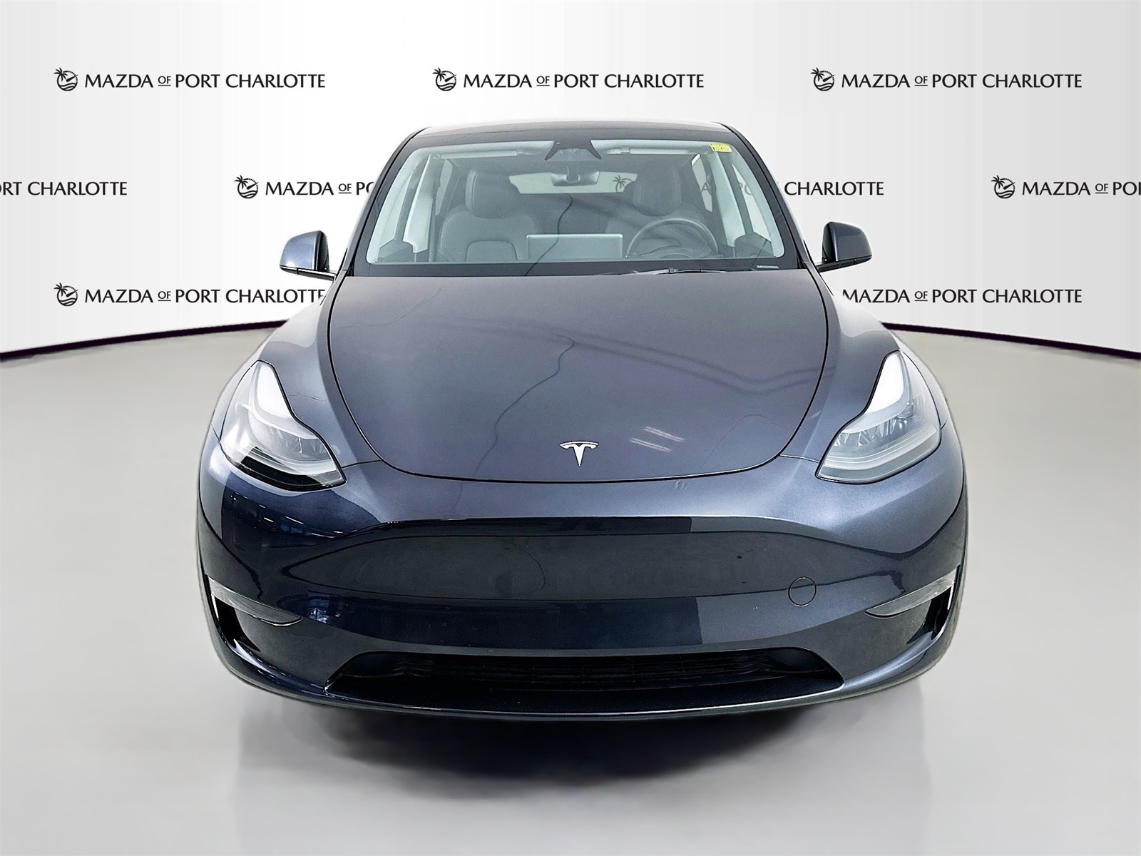 Used 2024 Tesla Model Y Long Range with VIN 7SAYGDEE5RA282340 for sale in Port Charlotte, FL