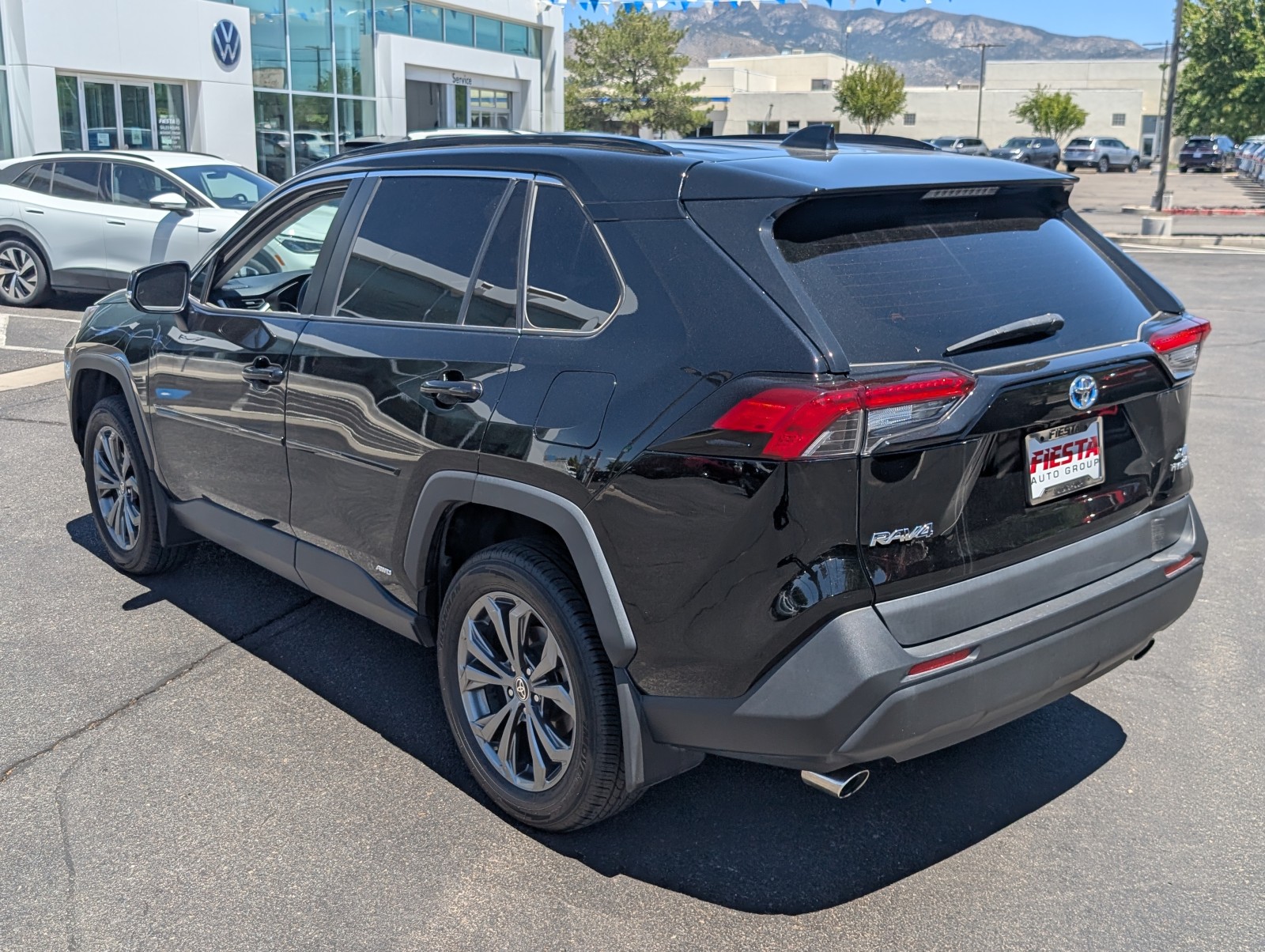 Used 2022 Midnight Black Metallic Toyota Hybrid XLE Premium image 7