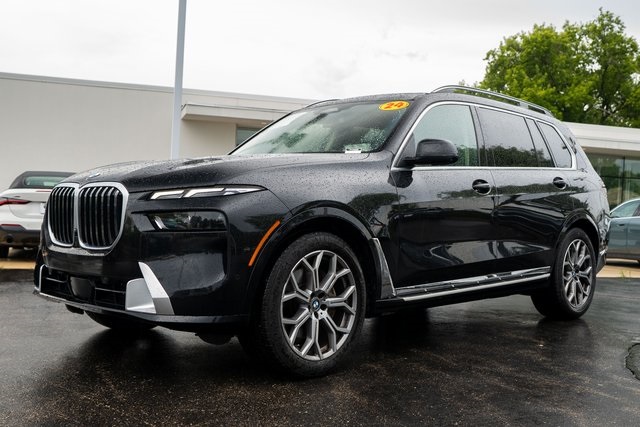 Certified Used 2024 Black Sapphire Metallic BMW xDrive40i image 1