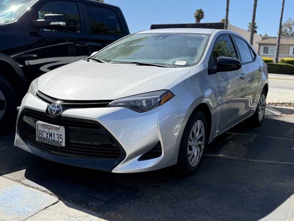 Used 2018 Toyota Corolla LE with VIN 5YFBURHE7JP797338 for sale in Poway, CA