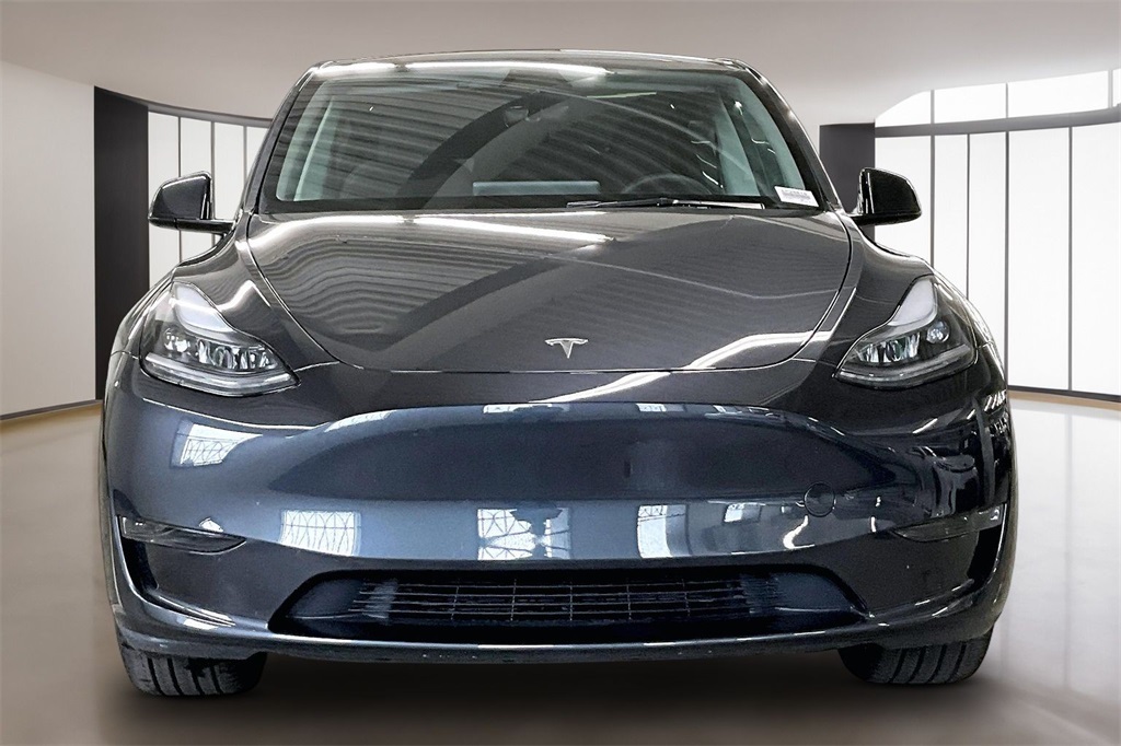 Used 2025 Tesla Model Y Long Range with VIN 7SAYGDED0SF226516 for sale in Kansas City