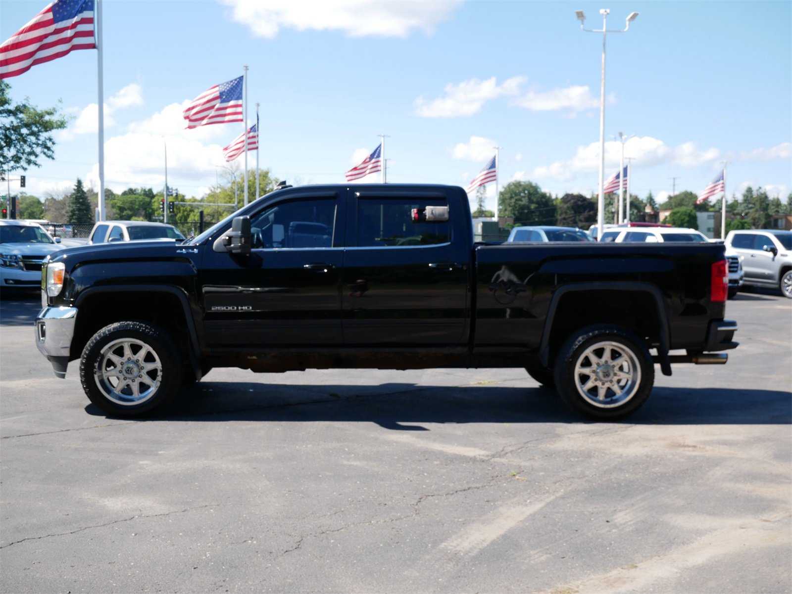 Used 2015 GMC Sierra 2500HD SLE with VIN 1GT12YEG8FF590358 for sale in White Bear Lake, Minnesota