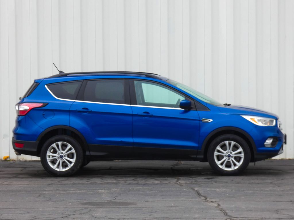 Used 2018 Ford Escape SE with VIN 1FMCU9GD9JUA90866 for sale in Kansas City