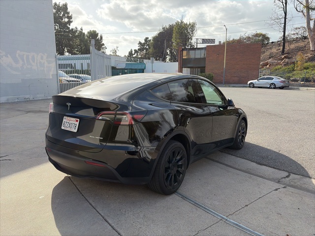 Used 2022 Tesla Model Y Long Range with VIN 7SAYGDEE1NF368709 for sale in Northfield, Minnesota