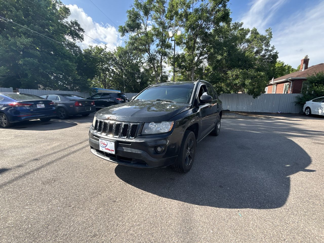 Used 2016 Black Jeep Sport SUV 4D image 1
