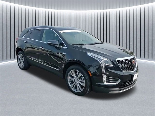 Used 2024 Stellar Black Metallic Cadillac Premium Luxury image 1