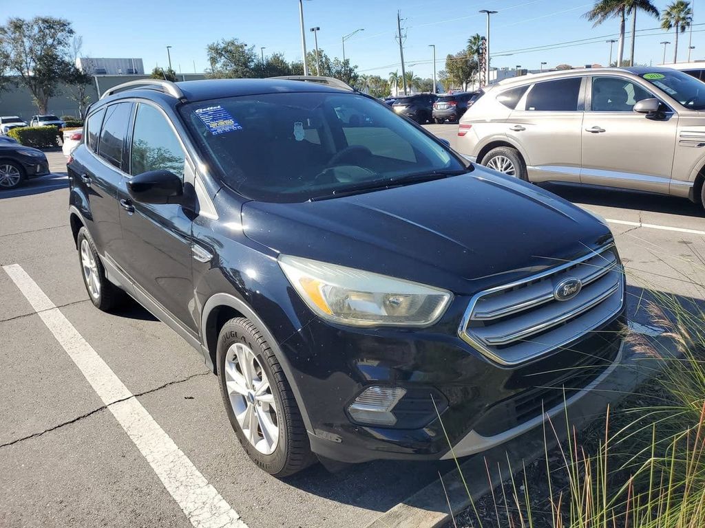 Used 2018 Ford Escape SE with VIN 1FMCU0GD9JUA07173 for sale in Punta Gorda, FL