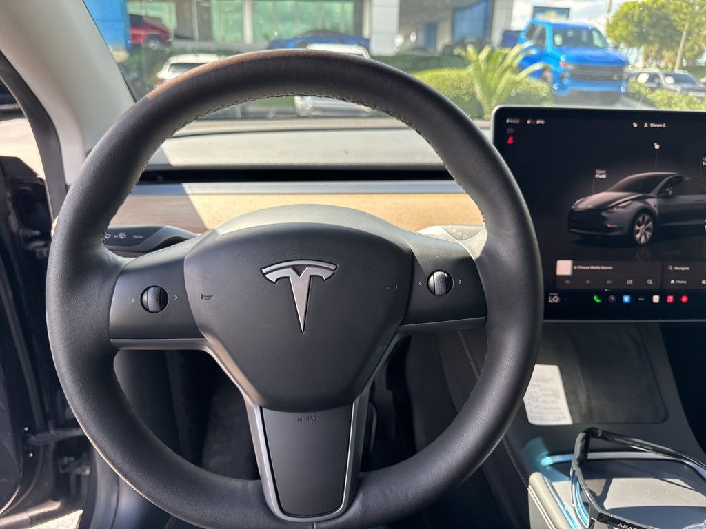 Used 2024 Tesla Model Y Long Range with VIN 7SAYGDEEXRA285007 for sale in Northfield, Minnesota