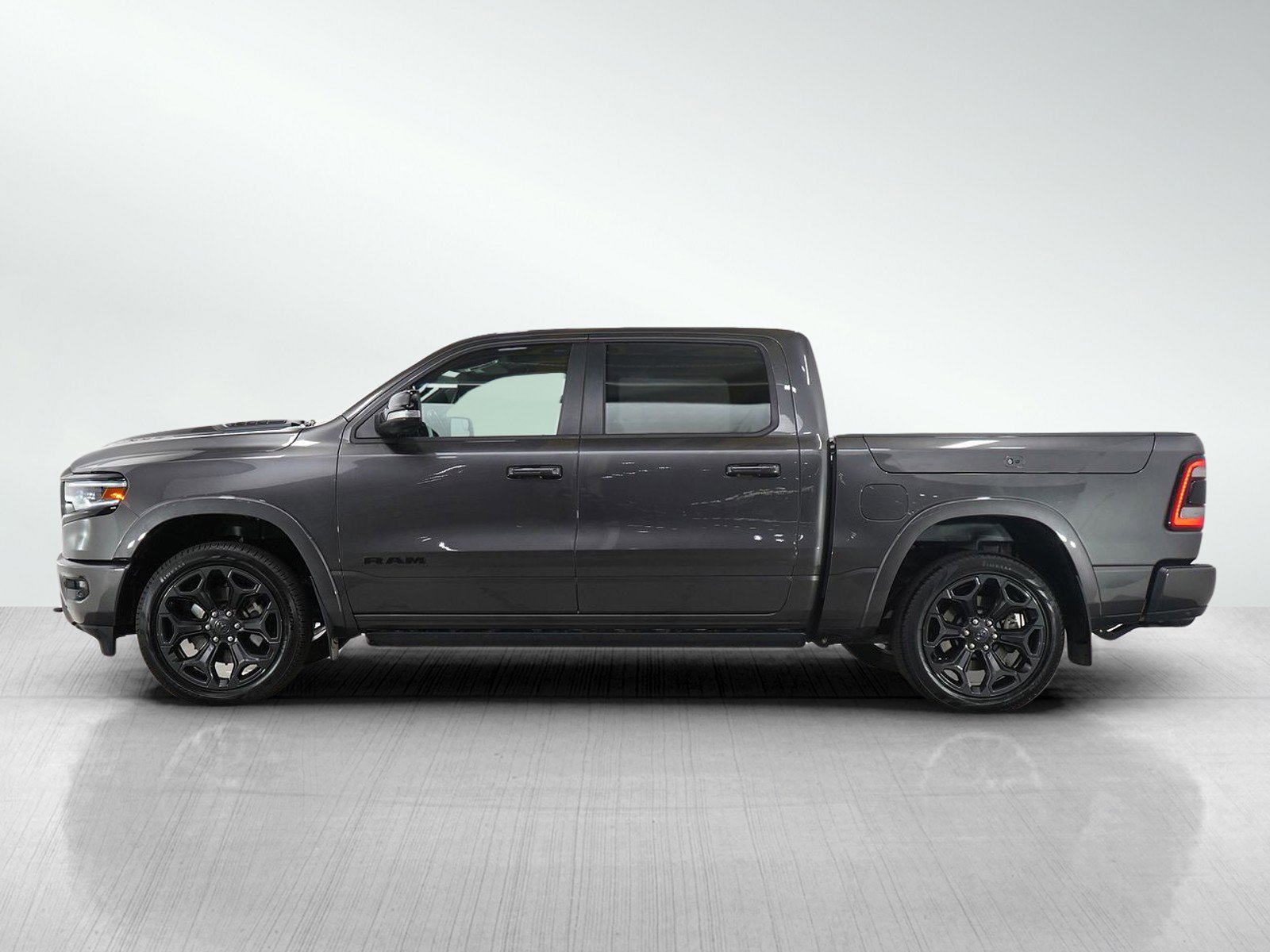 Used 2022 RAM Ram 1500 Pickup Limited with VIN 1C6SRFHT9NN147645 for sale in Hopkins, Minnesota