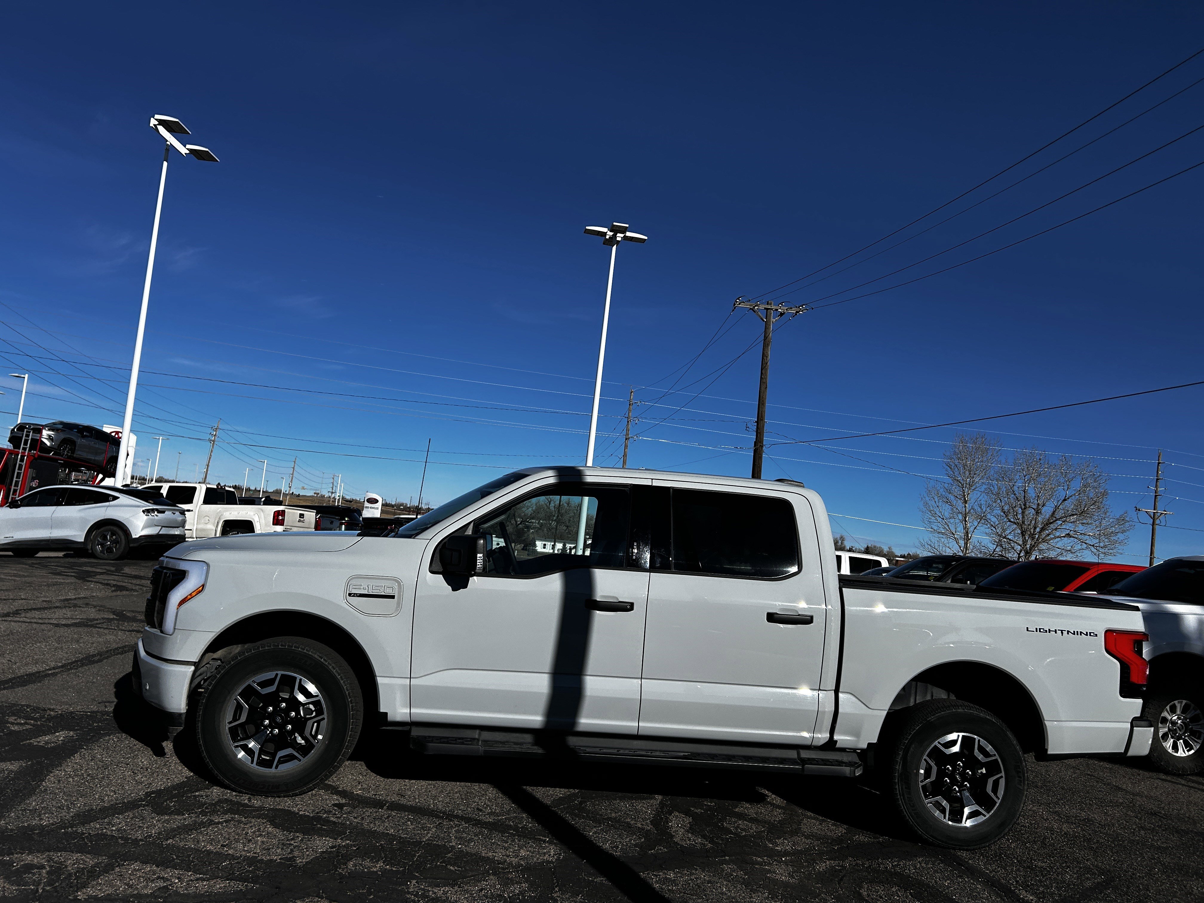 Certified 2023 Ford F-150 Lightning XLT with VIN 1FTVW1EL2PWG35242 for sale in Cheyenne, WY