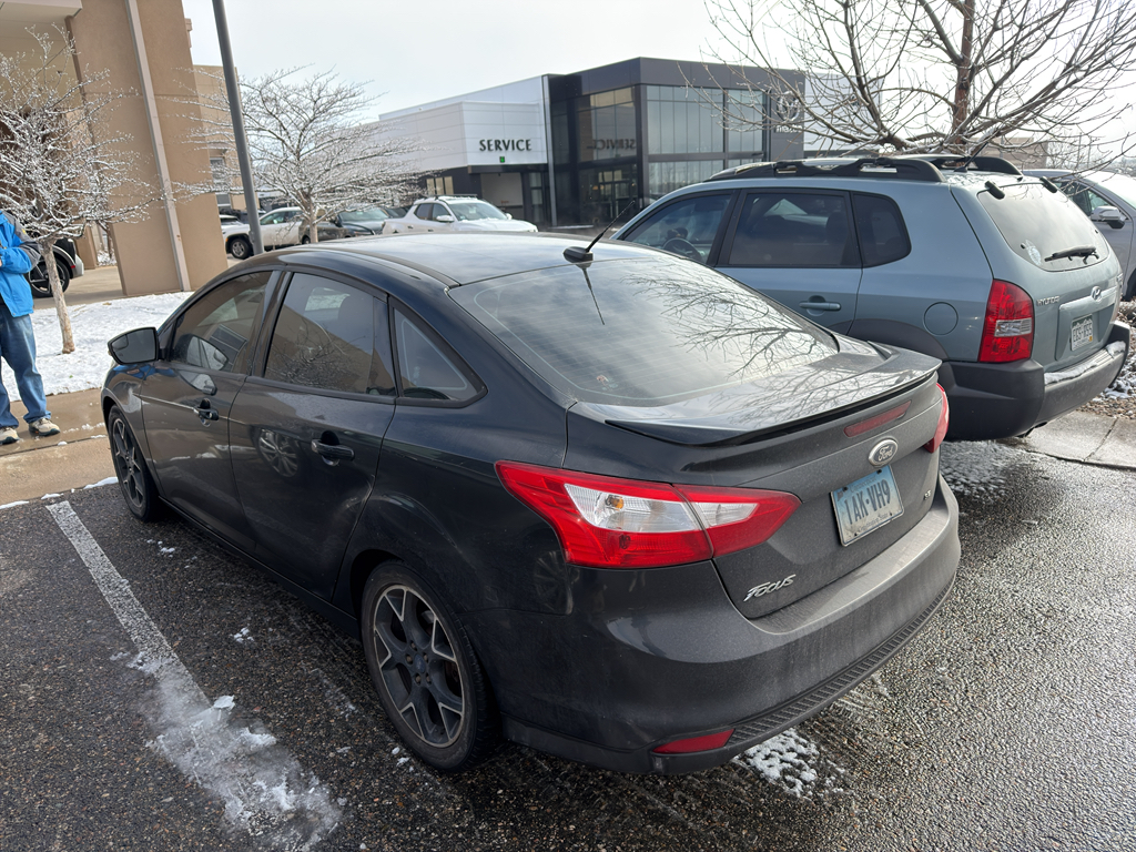 Used 2014 Ford Focus SE with VIN 1FADP3F26EL261958 for sale in Loveland, CO
