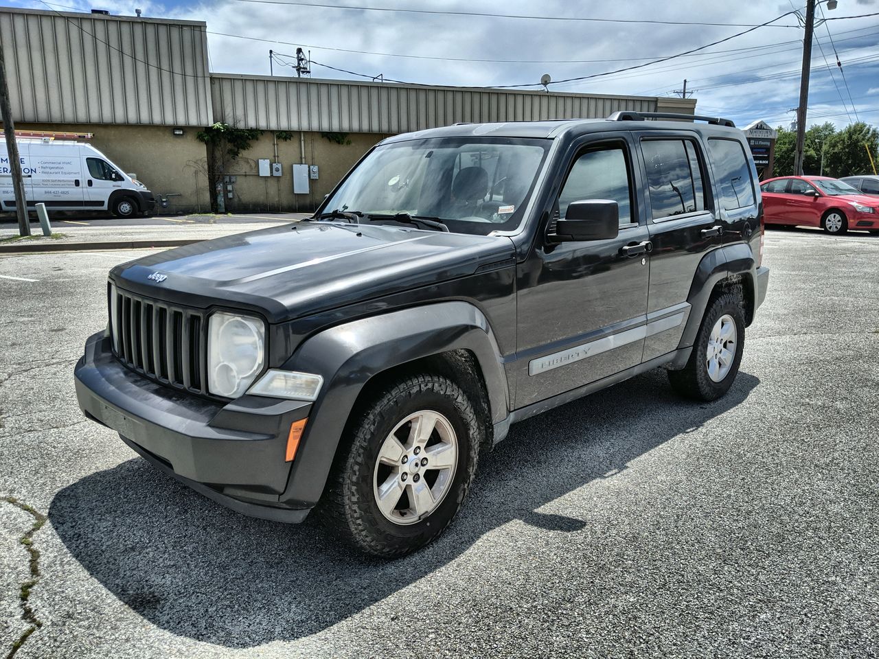 Used 2010 Grey Jeep SPORT image 1