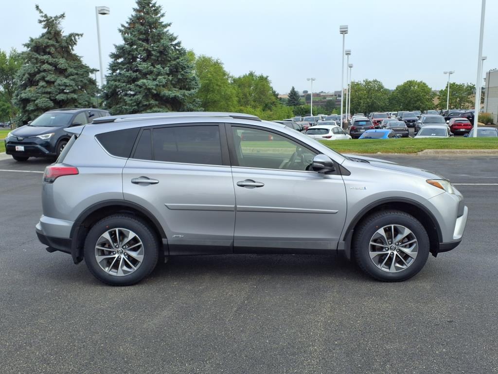 Certified 2018 Toyota RAV4 LE with VIN JTMRJREV0JD235232 for sale in Burnsville, Minnesota