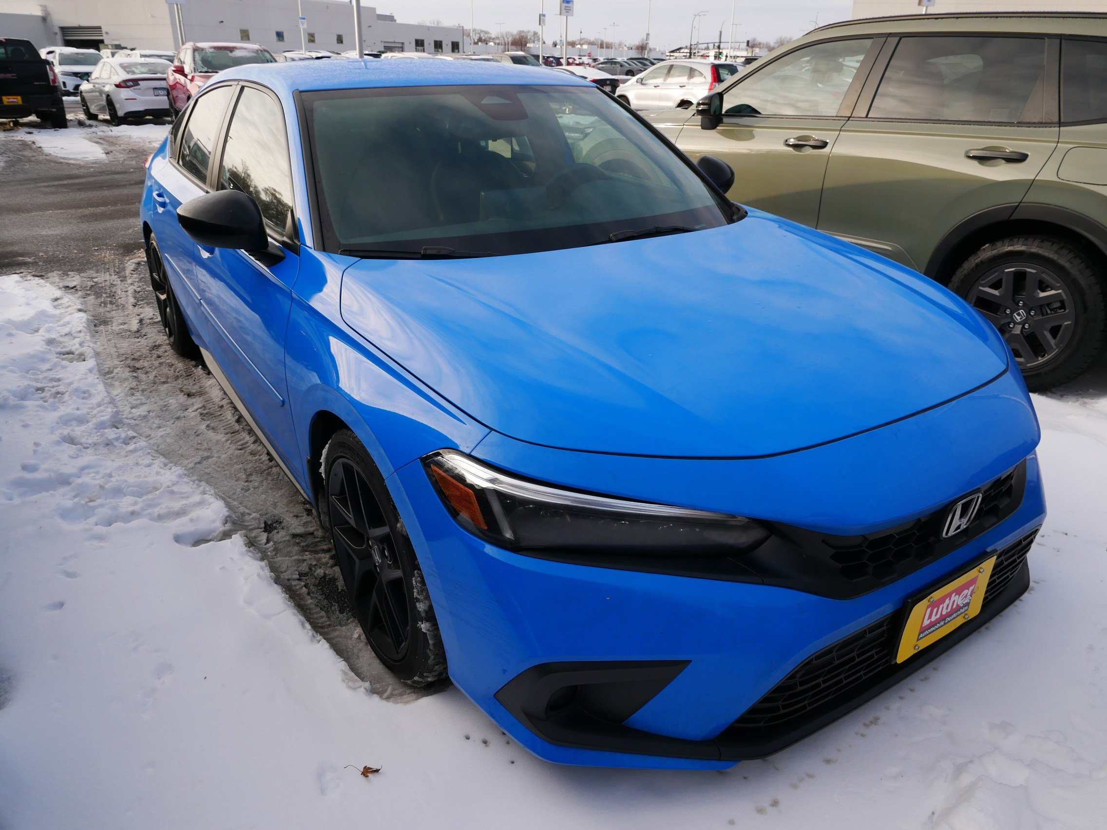 Used 2024 Honda Civic Hatchback Sport with VIN 19XFL2H8XRE001278 for sale in Brooklyn Center, Minnesota