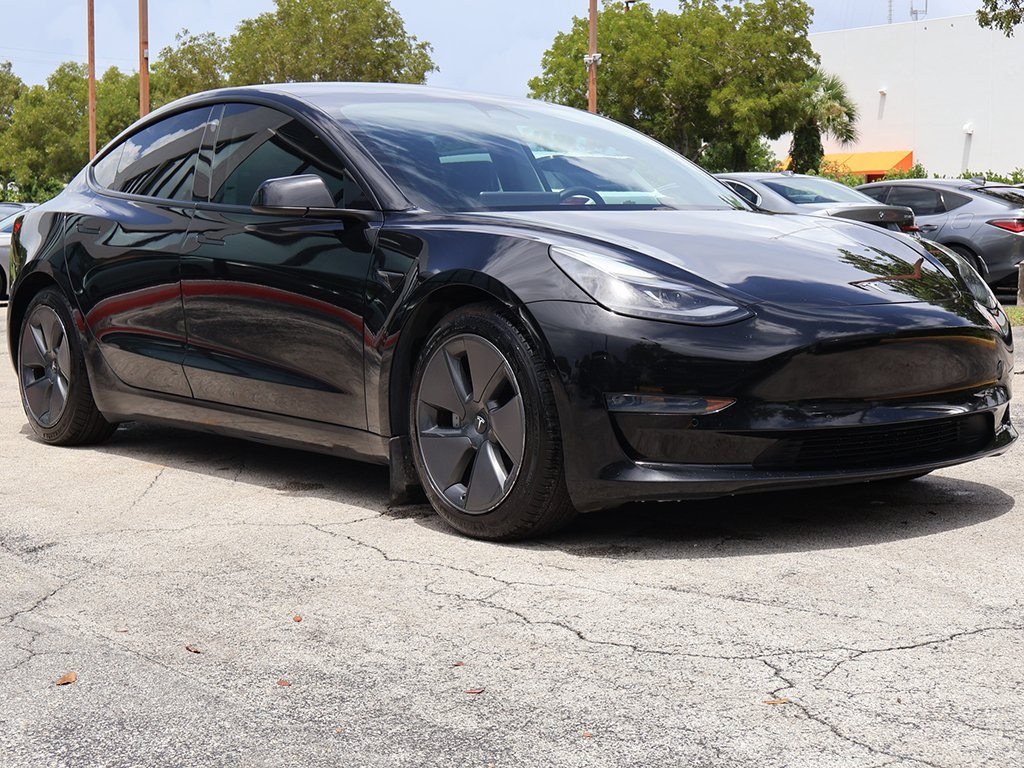 Used 2021 Tesla Model 3 Base with VIN 5YJ3E1EB0MF064061 for sale in Miami, FL