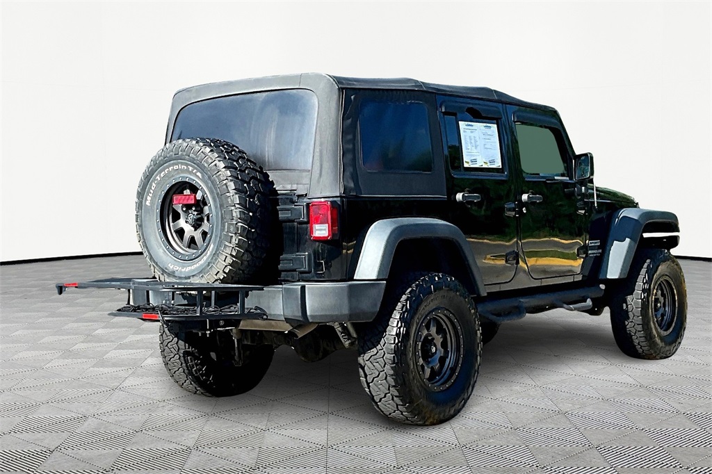 Used 2016 Jeep Wrangler Unlimited Sport S with VIN 1C4BJWDG2GL270680 for sale in Kansas City