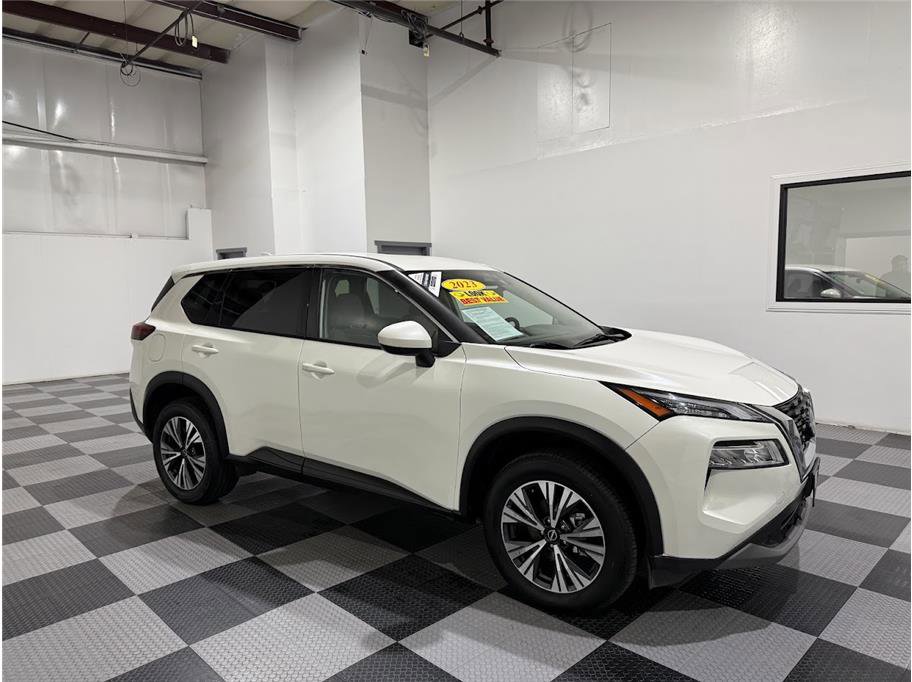 Used 2023 Pearl White Tricoat Nissan SV image 1
