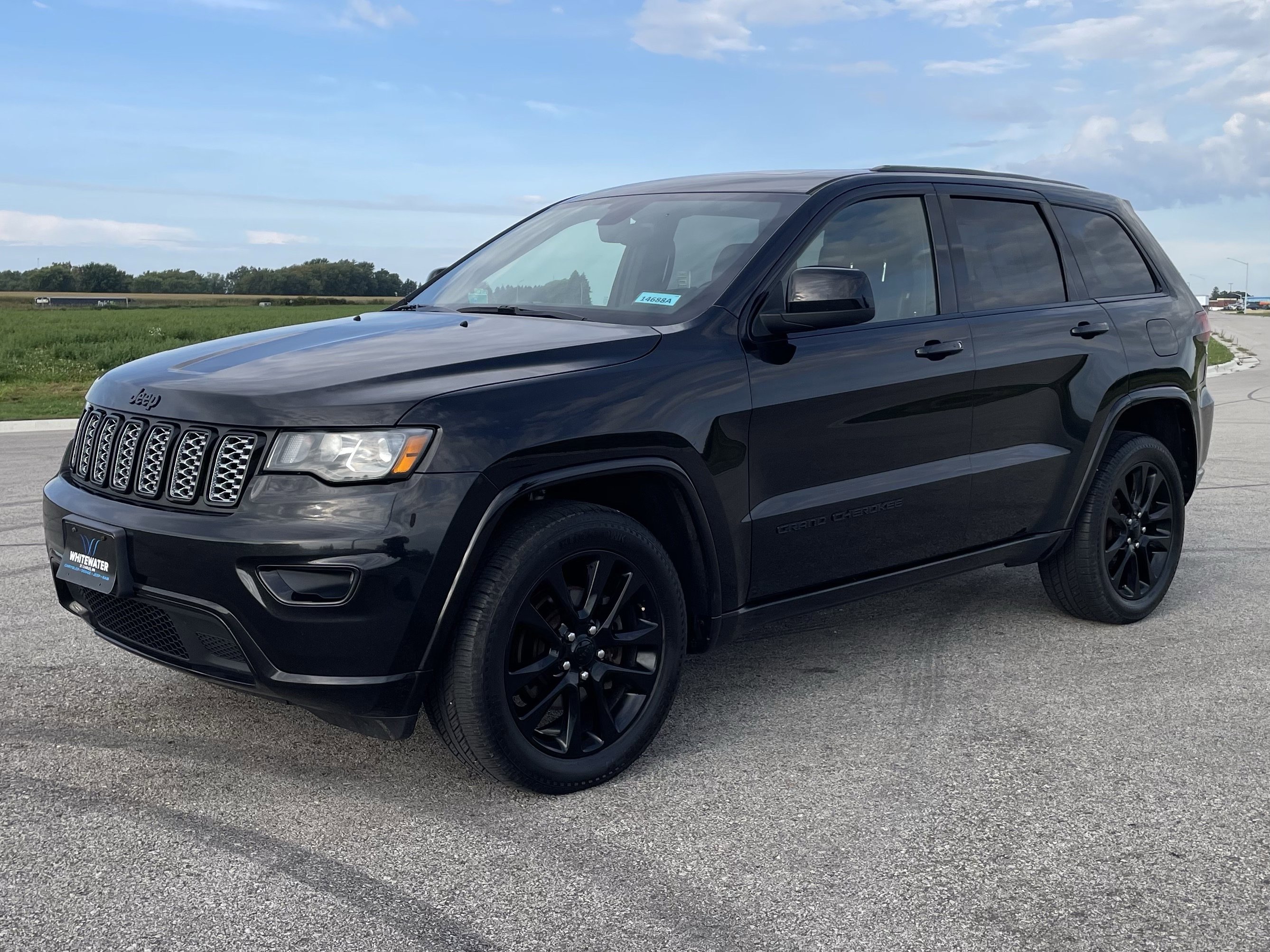 Used 2018 Jeep Grand Cherokee Altitude with VIN 1C4RJFAG7JC217242 for sale in Saint Charles, Minnesota