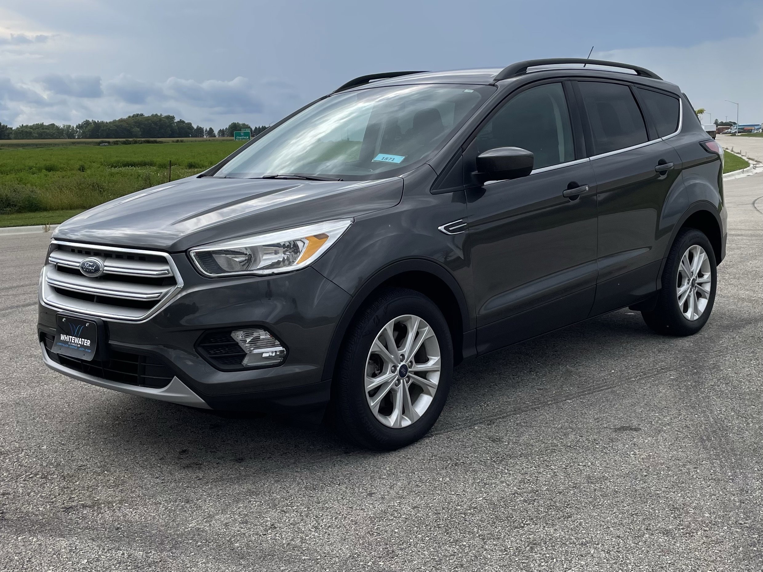 Used 2018 Ford Escape SE with VIN 1FMCU9GD7JUB13500 for sale in Saint Charles, Minnesota