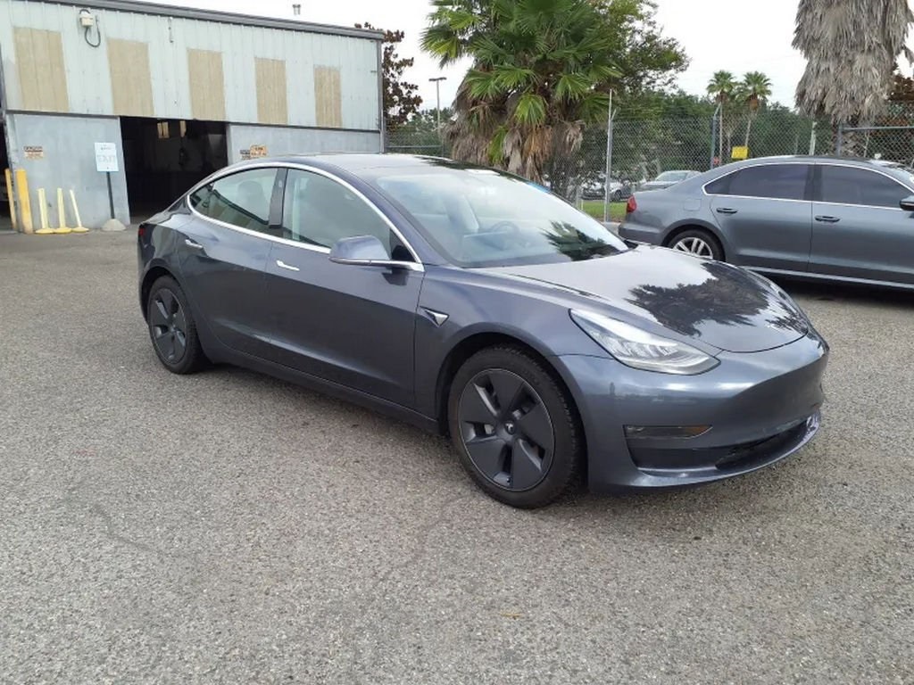 Used 2019 Tesla Model 3 Mid Range with VIN 5YJ3E1EA6KF331319 for sale in Miami, FL