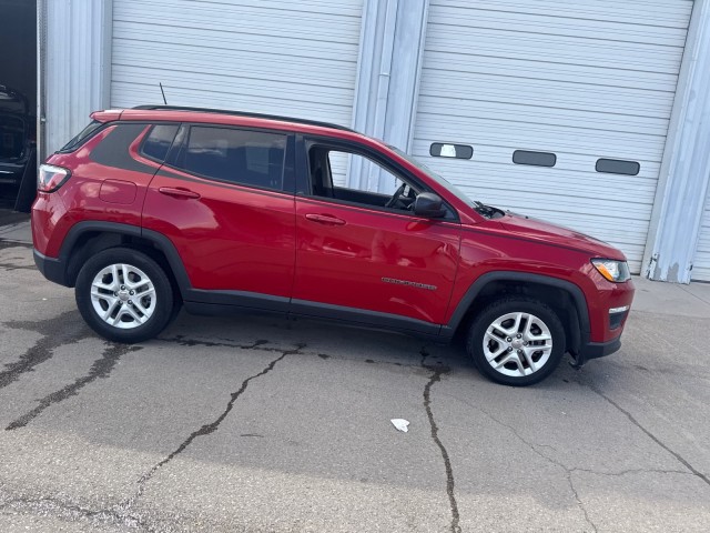 Used 2018 Redline Pearlcoat Jeep Sport image 1