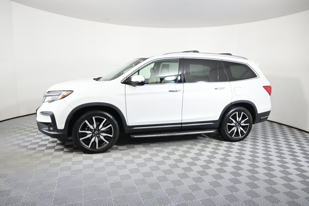 Used 2020 Honda Pilot Touring with VIN 5FNYF6H91LB057479 for sale in Forest Lake, Minnesota