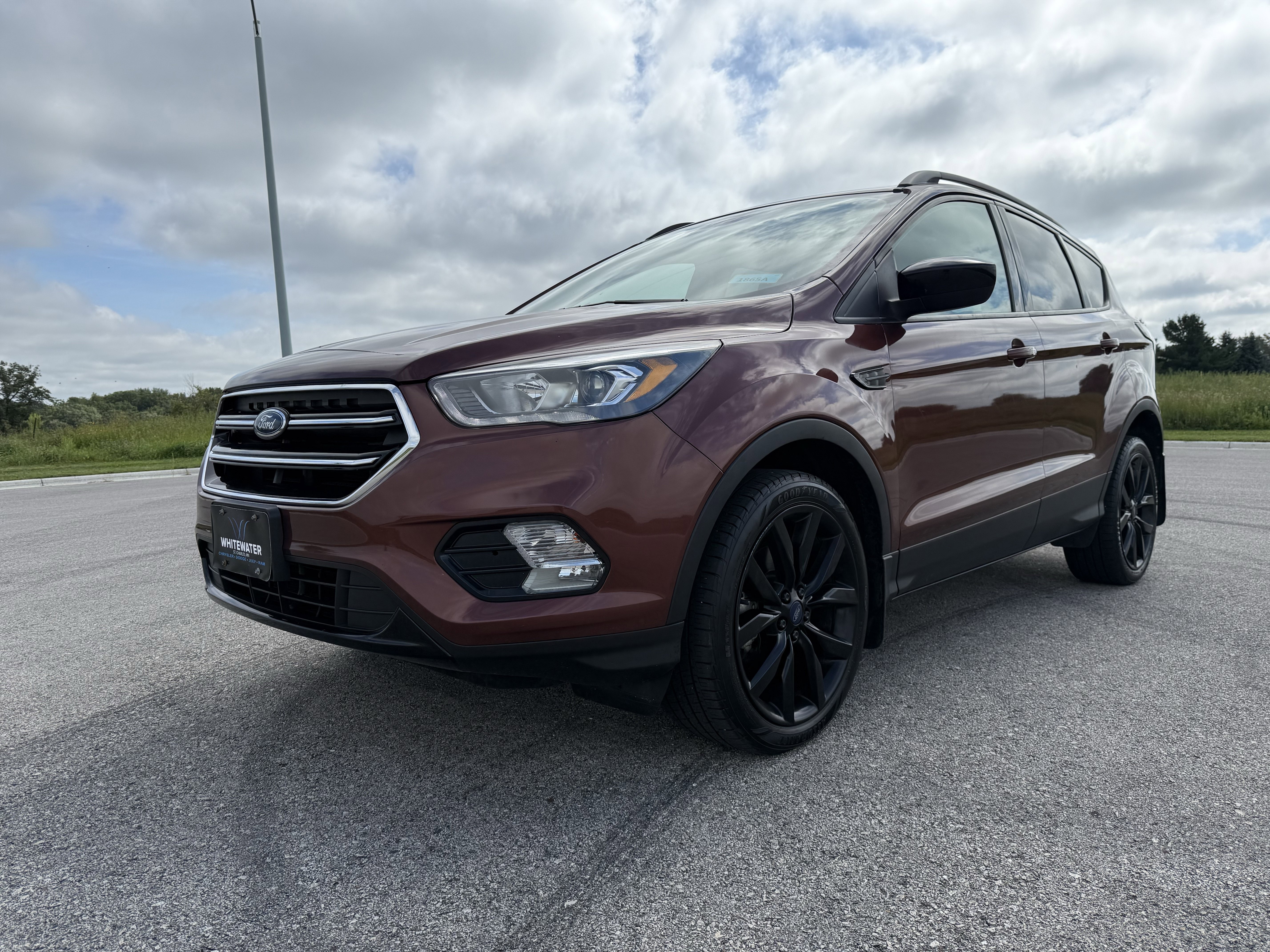 Used 2018 Ford Escape SE with VIN 1FMCU9GD4JUC19306 for sale in Saint Charles, Minnesota