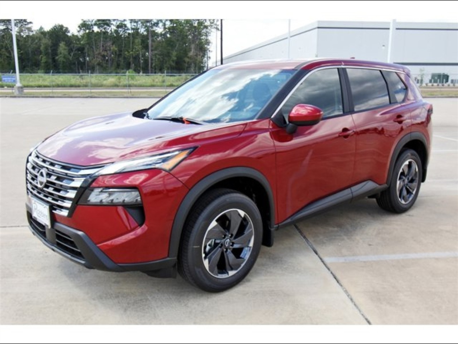 2026 Nissan Rogue SV Red at Robbins Nissan