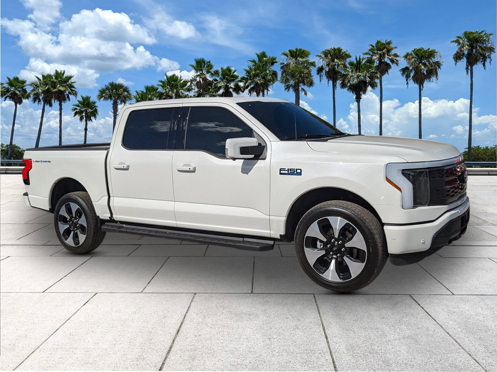 Used 2024 Ford F-150 Lightning Platinum with VIN 1FT6W7L77RWG24690 for sale in Port Richey, FL