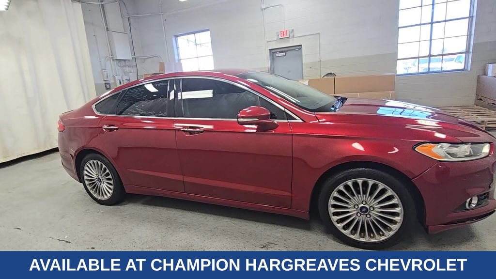 Used 2016 Ford Fusion Titanium with VIN 3FA6P0K92GR400661 for sale in Royal Oak, MI