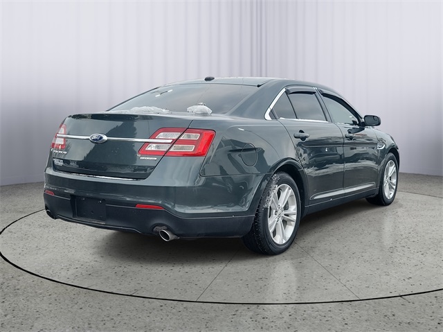 Used 2016 Ford Taurus SE with VIN 1FAHP2D88GG113597 for sale in Battle Creek, MI