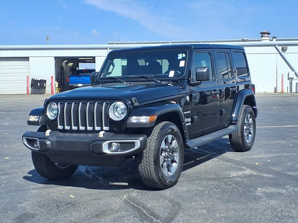 Used 2022 Jeep Wrangler Unlimited Sahara with VIN 1C4HJXEG2NW255266 for sale in Kansas City