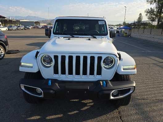 Used 2023 Jeep Wrangler 4xe Sahara 4XE with VIN 1C4JJXP62PW590326 for sale in Kansas City